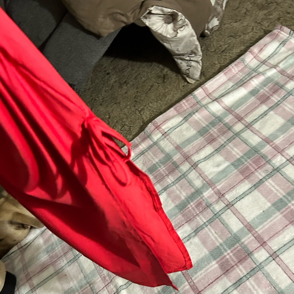 Red dress it says small but it fits like a medium I only tried it on one time.